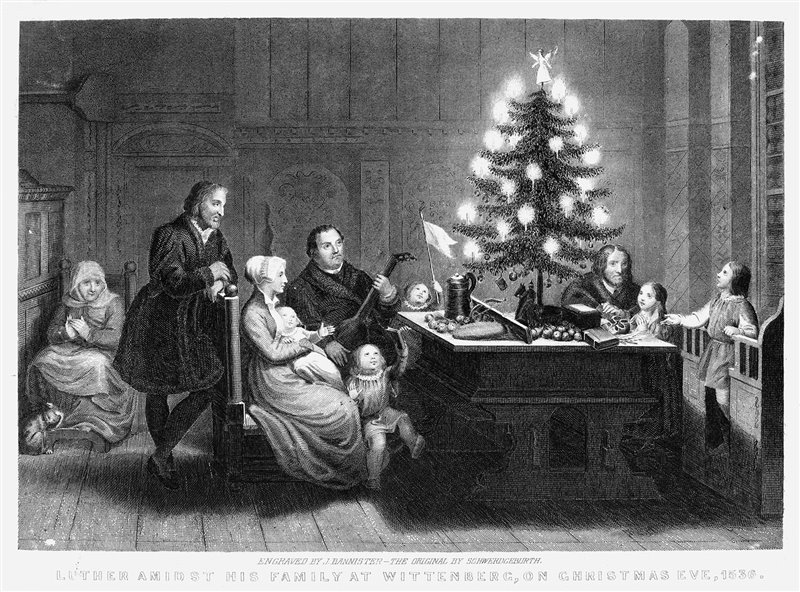 Martin Lutero davanti a un albero di Natale decorato con candele.Incisione risalente circa al 1850.Da Storica National Geographic