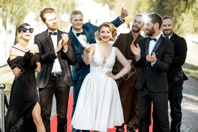 Movie actors on the red carpet outdoors foto attori