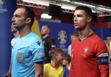 Giorgio Peretti, dalla parrocchia ai campi internazionali Aspettando l'ingresso in campo prima di una gara dell'europeo.