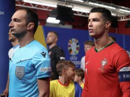 Giorgio Peretti, dalla parrocchia ai campi internazionali Aspettando l'ingresso in campo prima di una gara dell'europeo.